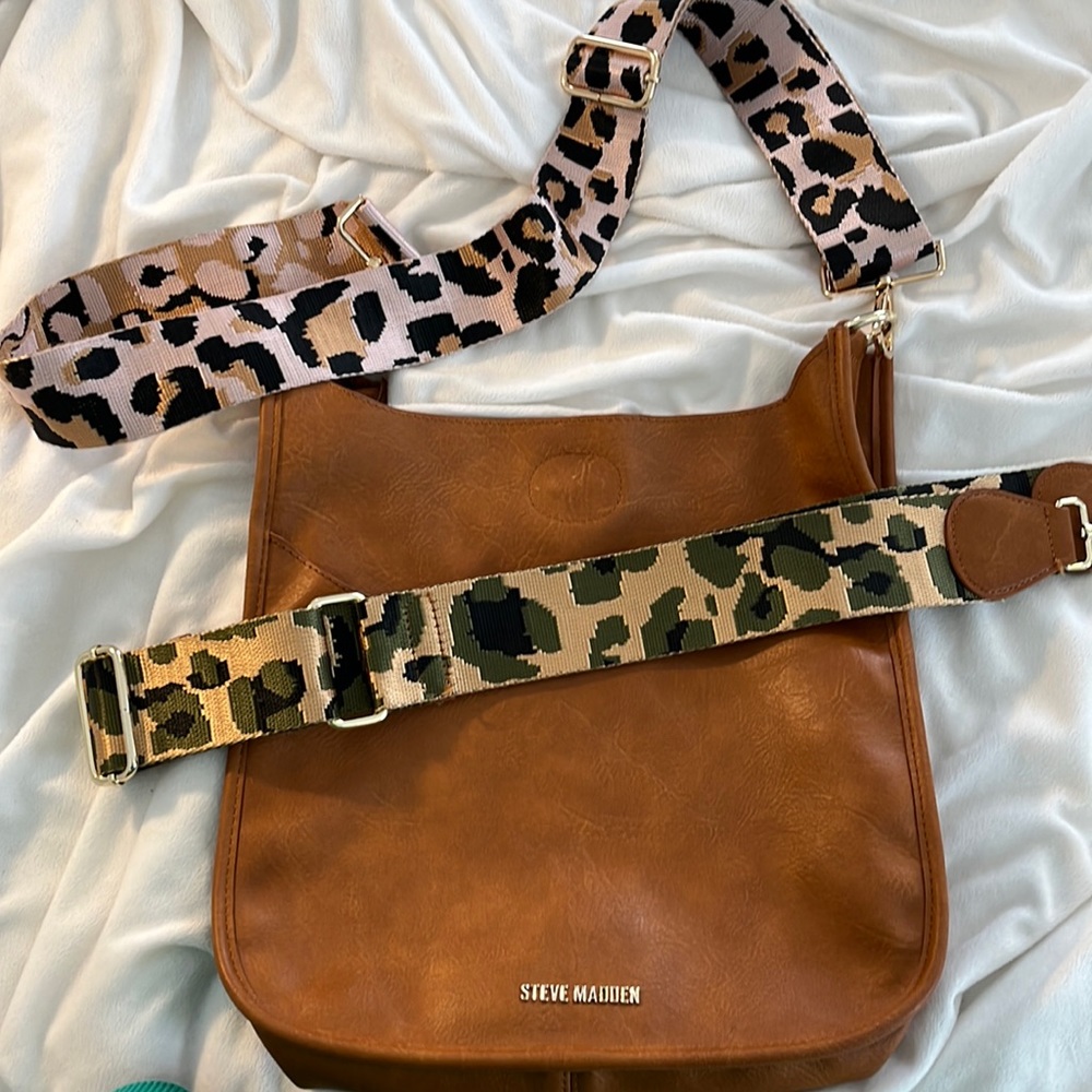 Steve Madden Crossbody bag with guitar strap.